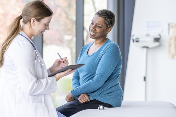 doctor talking to patient