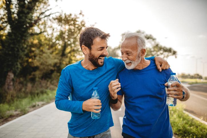 two men walking outside