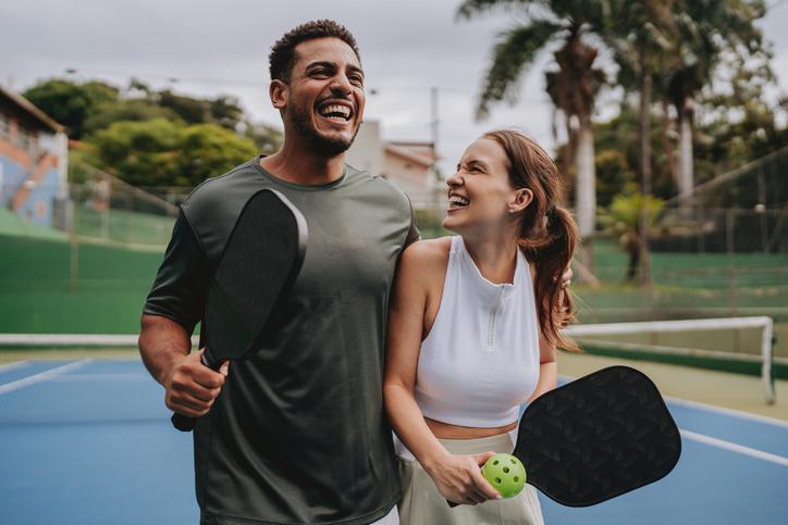 man, woman, pickleball