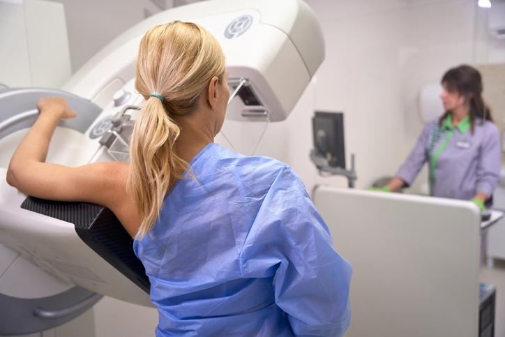 woman getting mammography