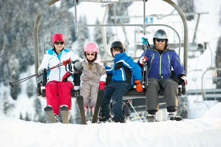 family on ski lift