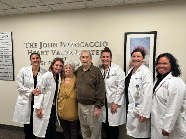 Victor and Joan Arnao with hospital staff