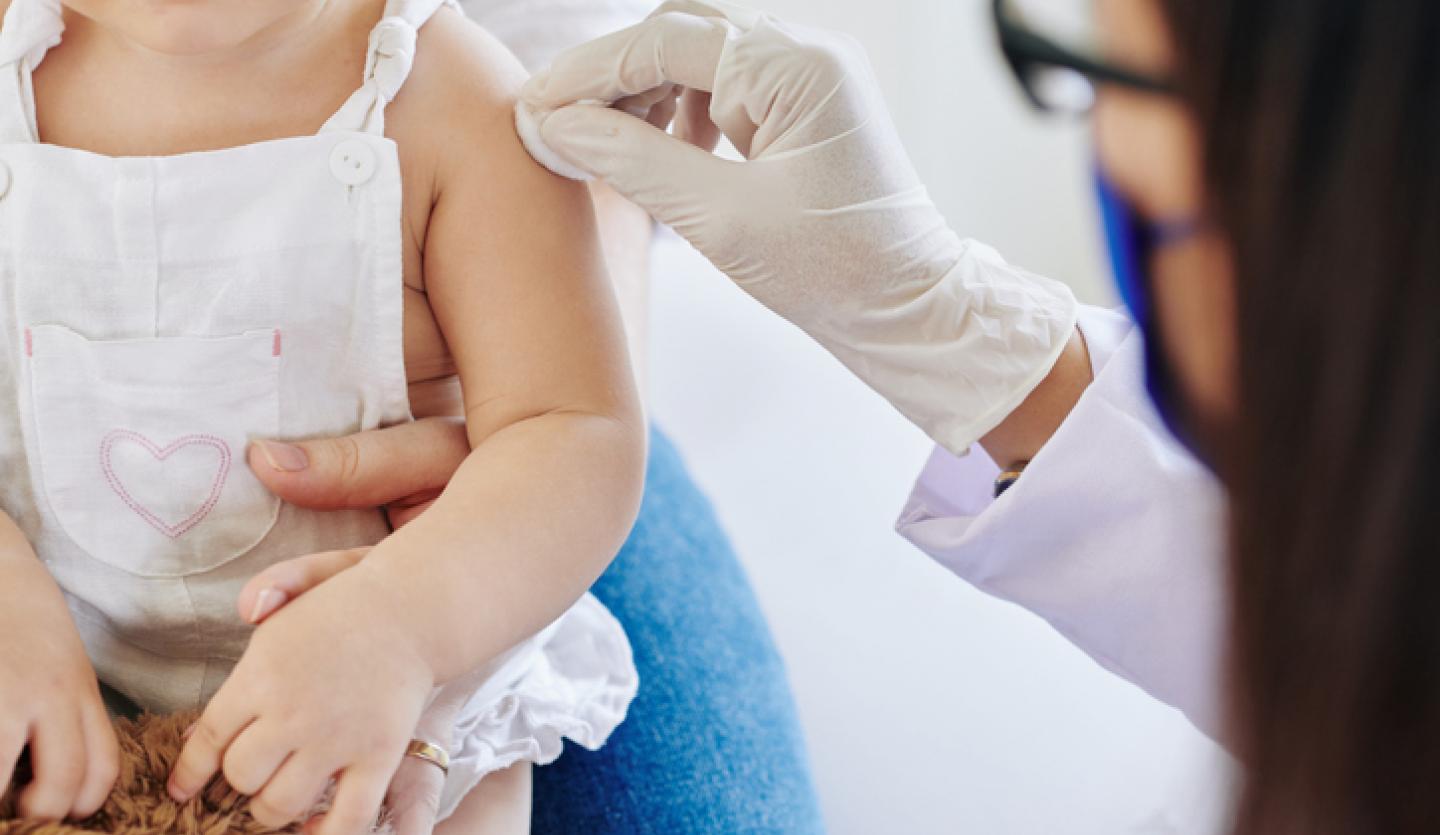 child getting vaccine