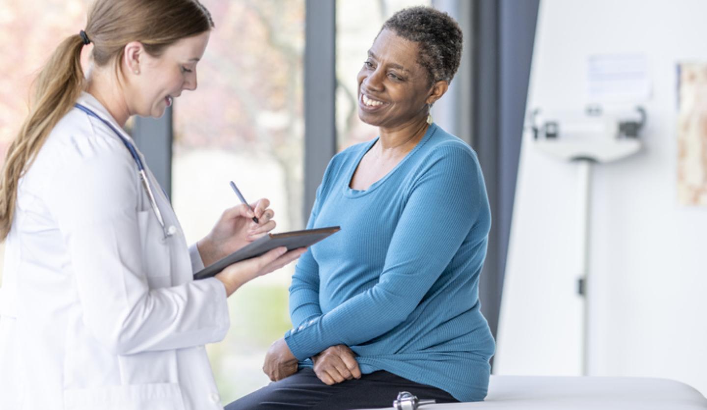 doctor talking to patient