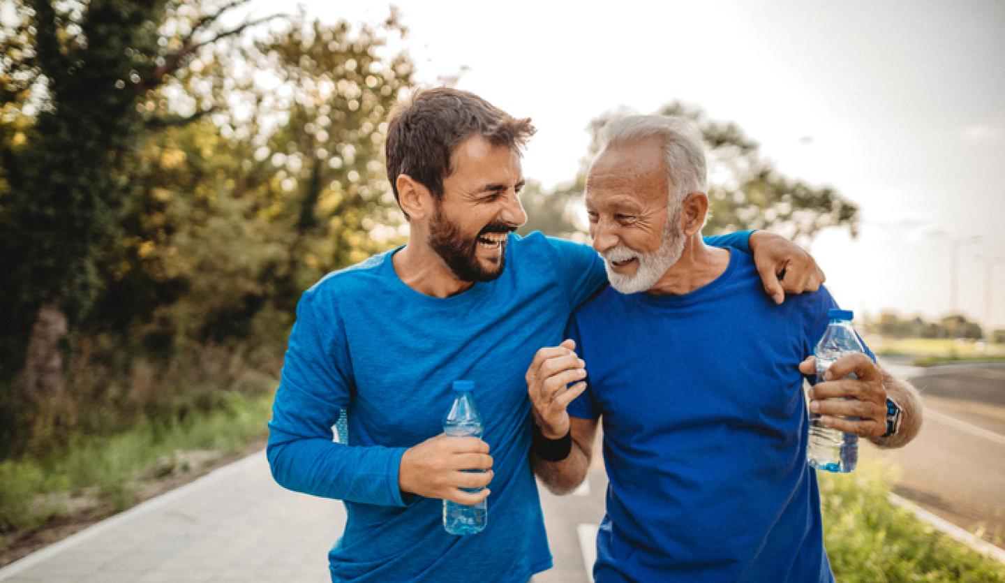 two men walking outside