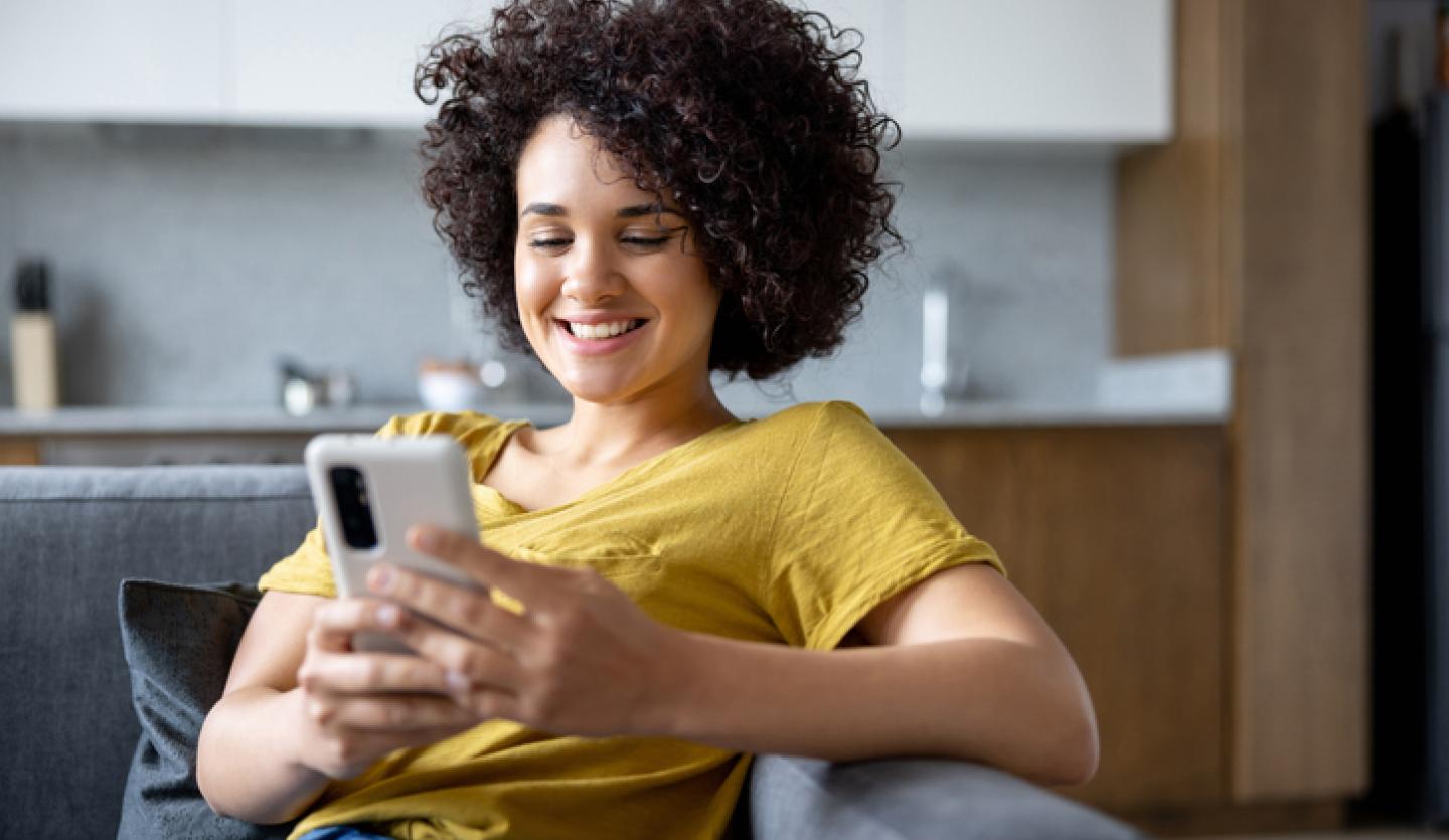 young woman looking at cell phone