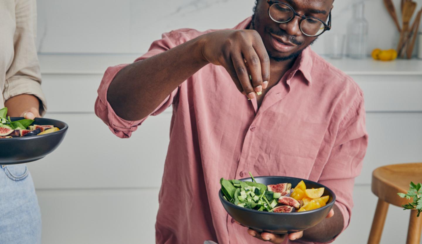 man making a salad