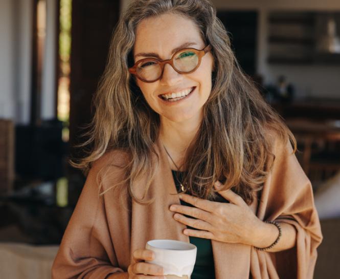 mature woman drinking beverage 