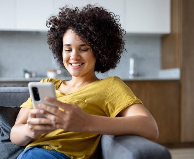 young woman looking at cell phone