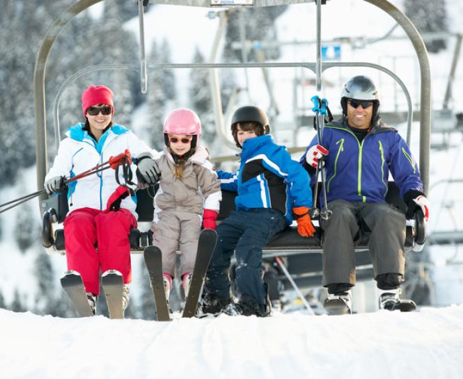 family on ski lift