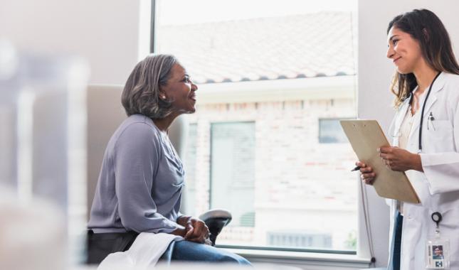 doctor talking to patient