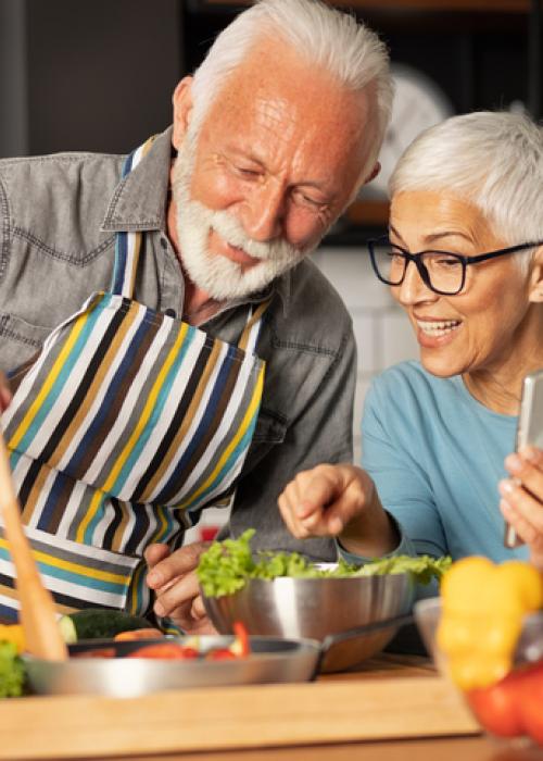 man and woman cooking